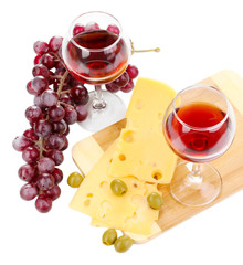 Wine in wineglasses and cheese isolated on white