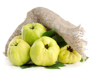sweet quinces with leaves, isolated on white