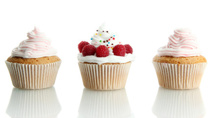 tasty cupcakes with berries, isolated on white