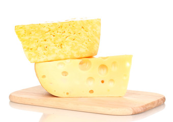 tasty cheese on wooden board isolated on white