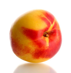 ripe nectarine, isolated on white