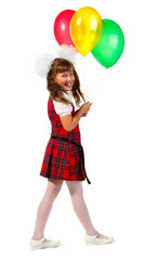 Fototapeta na wymiar Happy school girl with colorful balloons in his hand