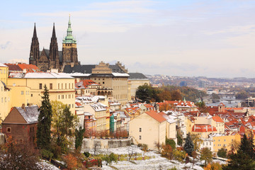 Obraz premium Romantic Snowy colorful autumn Prague gothic Castle, Czech