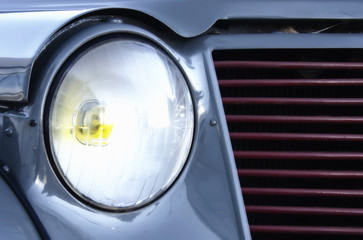 headlight and grill of old car