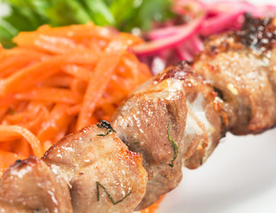 barbecue with sauce and vegetables