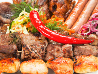 barbecue with sauce and vegetables