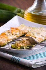 Zucchini stuffed with cheese.