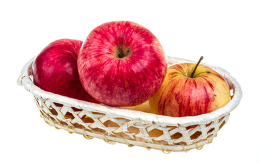 fresh red apples in the dish isolated on white background