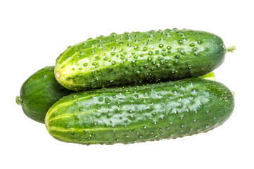 Healthy food. The green cucumbers isolated on white background