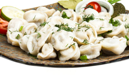 Bowl with traditional russian dish - pelmeni