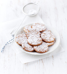 Crunchy cookies dusted with icing sugar