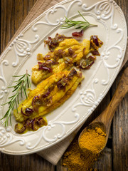 sole fish with curry and onions