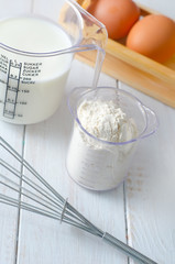 ingredients for dough, eggs, flour and milk