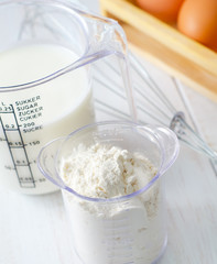 ingredients for dough, eggs, flour and milk