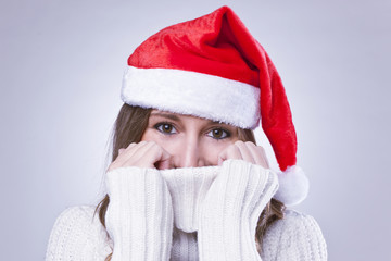 beautiful Christmas woman with santa hat