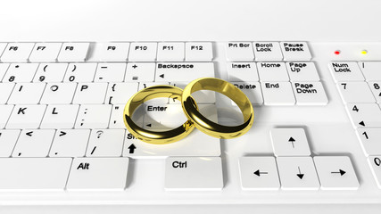 Wedding rings on the keyboard