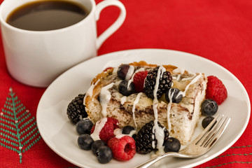Christmas coffee cake with fresh berries and coffee