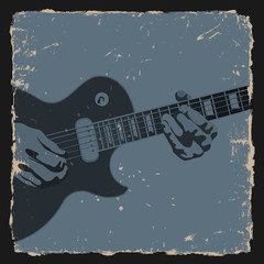 Guitar player on grunge background