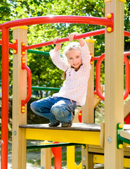 little girl on outdoor playground