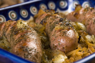 Roasted sausages with sauerkraut - polish dish