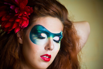 Obraz premium face-art portrait of a beautiful woman
