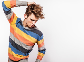 Elegant young handsome man. Studio fashion portrait.