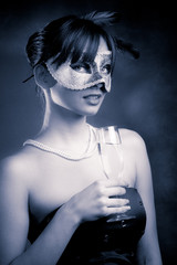 mask and champagne