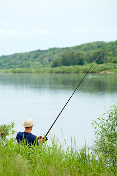 Man fising on a river