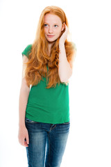 Fashion girl with long red hair against white background.