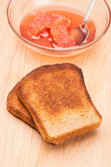 toast from bread with jam and spoon