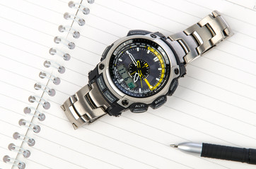 Expensive watch and pen