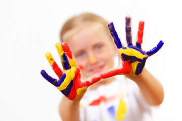 happy child with paint on the hands
