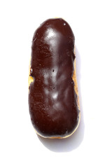 Chocolate cream filled donut on white background.