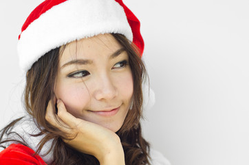 Beautiful young santa clause woman, isolated