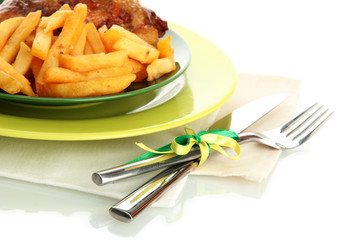 Roast chicken with french fries and vegetables