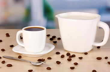 A cup of strong coffee and sweet cream