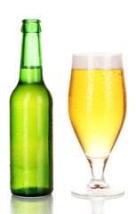 Bottle and glass of beer isolated on white