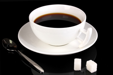 A cup of strong coffee isolated on black