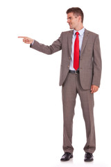 business man pointing at copyspace