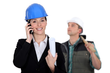 An architect and a foreman.