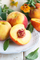 Fresh peaches on a plate
