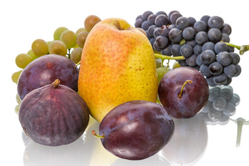 Ripe fruit on white background