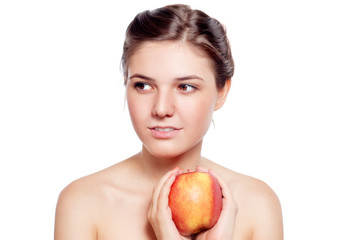 Beautiful  brunette with the red apple