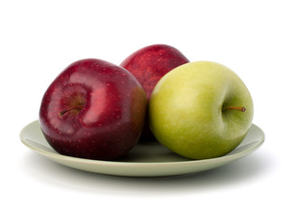 Apples pile on plate