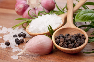 Fresh herbs and salt spoon