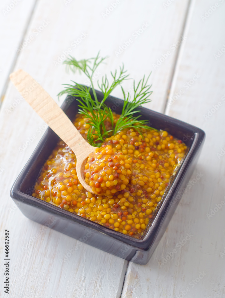 Canvas Prints Mustard in the black bowl on table