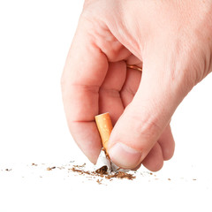 hand extinguishing a cigarette on white