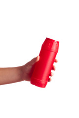 red bottle with cleaning powder isolated on white