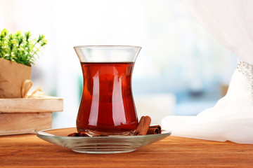 glass of Turkish tea, on wooden table
