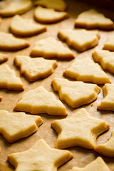 Fototapeta na wymiar Closeup baked homemade cookies on a baking tray